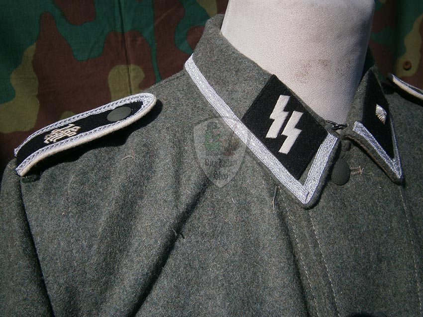German WW2 Waffen SS NCO Field tunic M40 with insignia German WW2 Waffen SS NCO Field tunic M40 with insignia