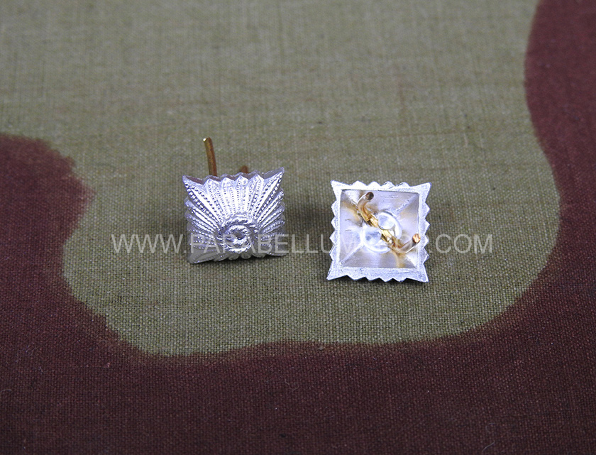 Silver pips stars NCO shoulders